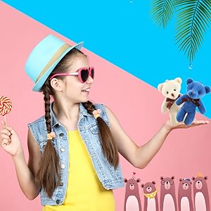 the mini teddy bears are made of farbic, which is lightweight, easy to carry and hold