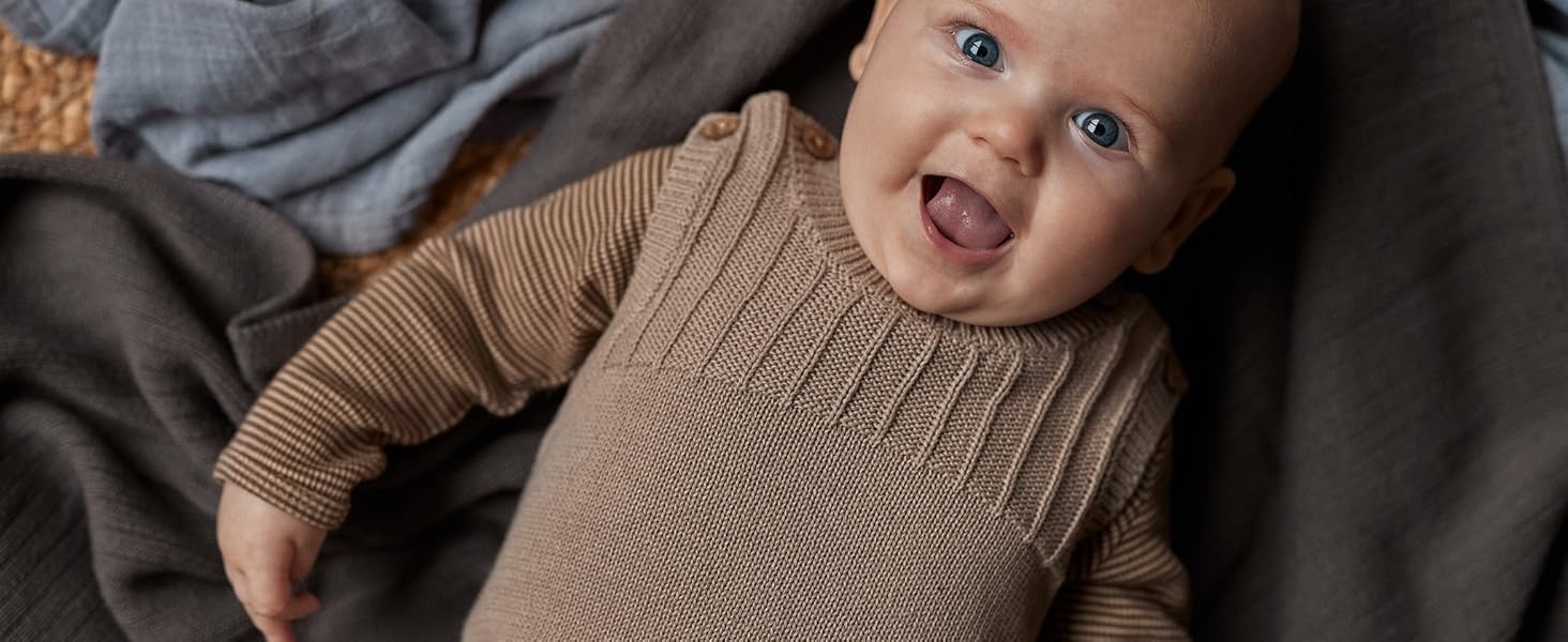 baby laying on the softest ribbed knitted blanket from huxie denmark