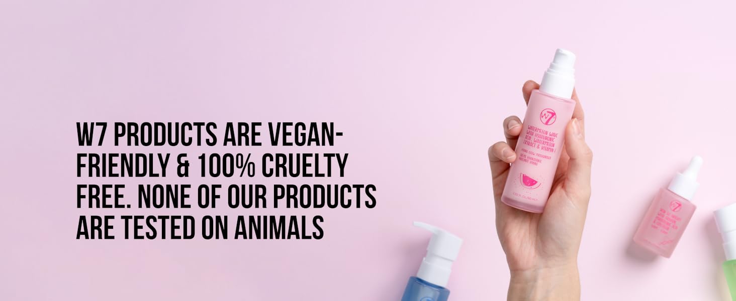 a hand holding a bottle of vegan cruelty - free skincare product