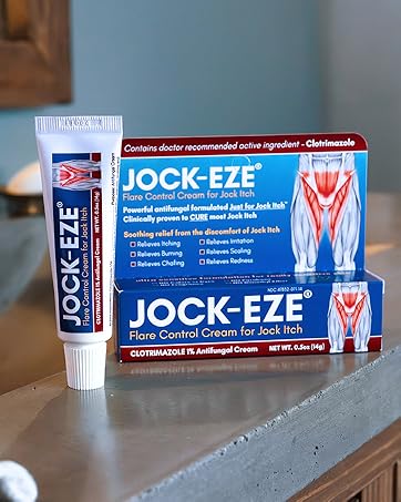 JOCK-EZE Flare Control Cream for Jock Itch product box and tube applicator sitting on bathroom sink
