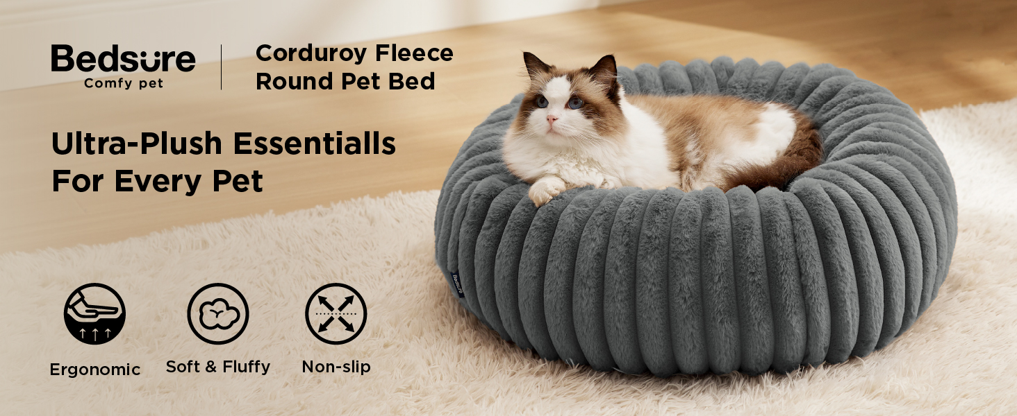 Text reads 'Bedsure Corduroy Fleece Round Pet Bed Ultra-Plush Essentials For Every Pet'. Gray circular pet bed with corduroy texture containing a resting cat.