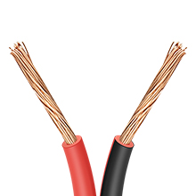 Two-conductor electrical wire with red and black insulation, showing exposed copper strands at the ends.