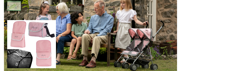 Girl with the Zipp Twin dolls pushchair standing next to family sat on a bench