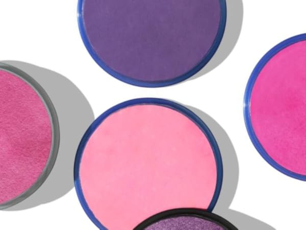 Collection of circular makeup removing pads in purple and pink colors arranged in a repeating pattern against white background.