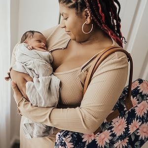 Baby Boldly momma with hospital bag and baby