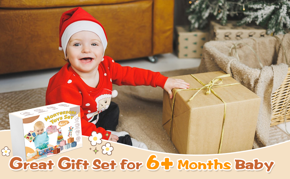Gift set package for babies displayed with wrapped present and holiday-themed card against wooden floor background.