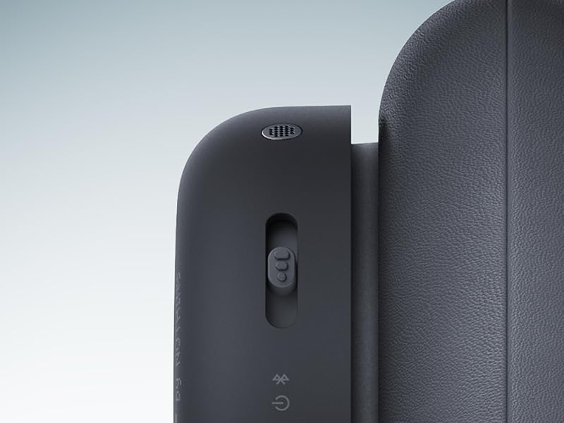 Close-up views of a black electronic device showing details of buttons and curved edges against dark background.