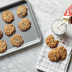 anolon baking sheet with cookies and milk