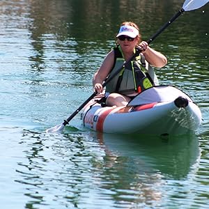 Woman paddling the Buoy Watersports Echo Single Kayak