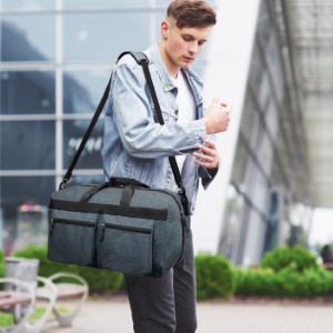 Man sitting on a bench with his nicely packed duffel storage for the overnight weekend stay