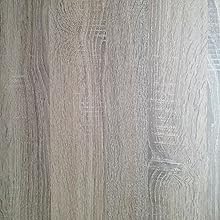 Nahaufnahme von hellen Holzböden oder -verkleidungen. Strukturierte Oberfläche mit sichtbaren Knoten und Maserungsmustern in Beige- und Grautönen