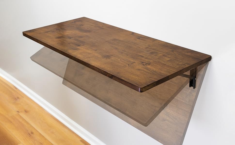 Collapsible wall-mounted table top for your workshop, garage, laundry room, RV, office, and more. 
