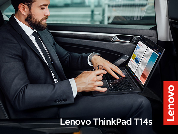 Businessman using Lenovo ThinkPad T14s laptop in the back seat of a car, focused on work.