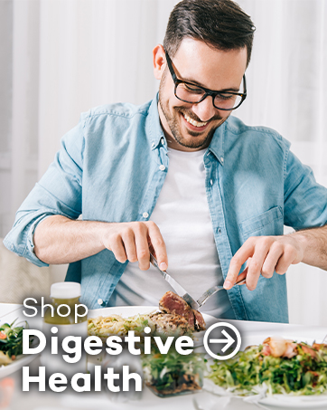 Man preparing salad in kitchen, demonstrating digestive health products. Text overlay reads 'Shop Digestive Health' with arrow.