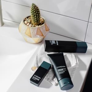 Clay cleanser, spf moisturizer and 3-in-1 hydro boost gel on bathroom vanity with cactus.