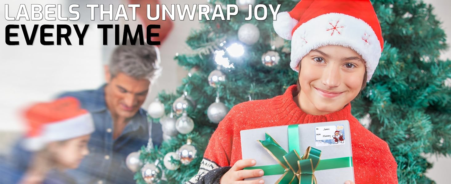 Holiday-themed scene showing wrapped gift in green paper being held near a Christmas tree. Text overlay about unwrap joy visible at top.