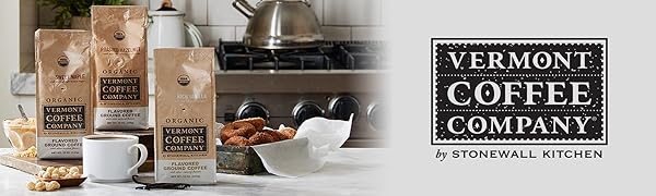 Vermont Coffee Company flavored coffees on a counter top with the brand logo.