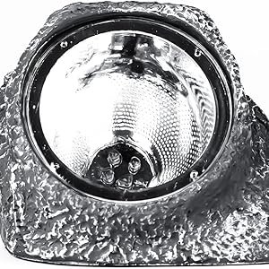 Solar-powered rock light designed for outdoor landscaping, providing ambient lighting.