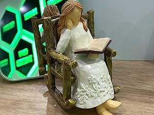 reading woman figurine