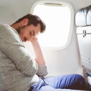 Monsieur inconfortable en voyage