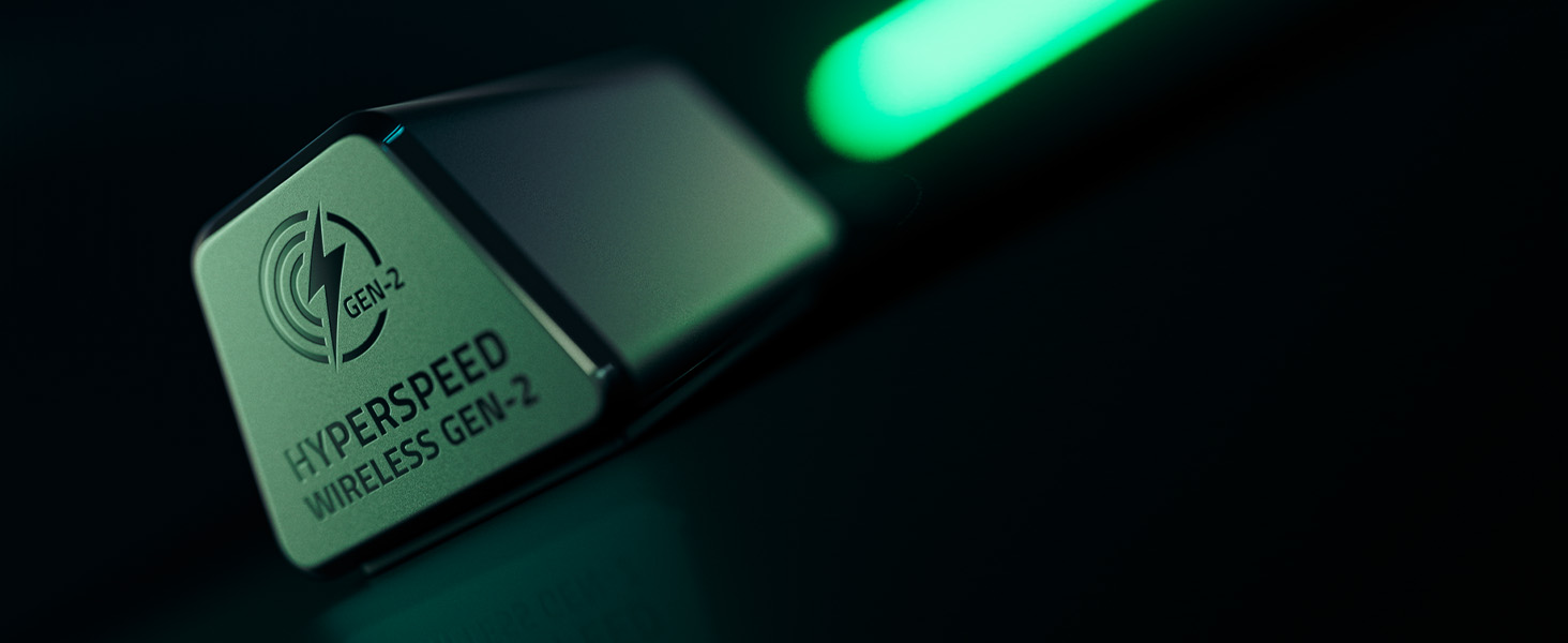 Photographie de produit sombre avec éclairage d'accentuation vert montrant les composants techniques de l'appareil sur lesquels la marque « HYPERSPEED » est visible.