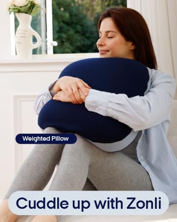 A woman holding a Zonli Weighted Pillow, presenting the product&#39;s usage scenario.