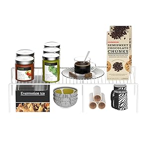 Collection of glass jars and containers displaying various food products, including preserves and spreads, arranged in a product showcase layout.