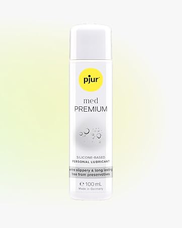 White bottle of pjur med PREMIUM silicone-based personal lubricant, 100 ml size, with water droplet imagery on packaging.