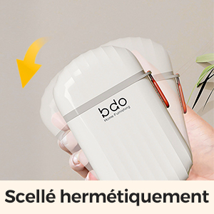 Un contenant blanc de forme ovale avec un couvercle transparent. L'inscription « bdo » est imprimée sur le contenant et semble être hermétiquement fermé