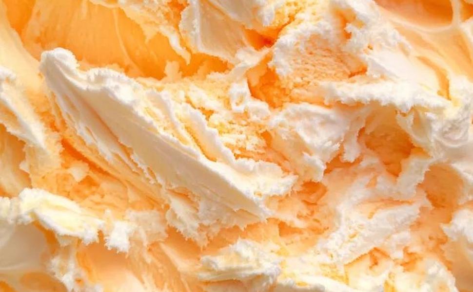 Creamy orange ice cream with white and orange swirls