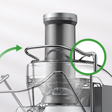 Industrial valve or connector mechanism shown in black and white with green circular highlights indicating connection points or features.