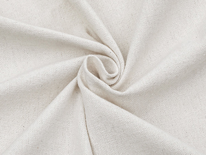 Close-up of off-white fabric with a soft, textured surface. The material is shown in a twisted or folded configuration, highlighting its flexibility and woven structure.