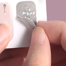 2.Tear off the nail sticker carefully
