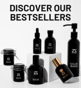 Collection of black cosmetic bottles and jars with gold accents. Products include pump bottles, dropper bottles, and jars in various sizes. Text reads 'DISCOVER OUR BESTSELLERS'.