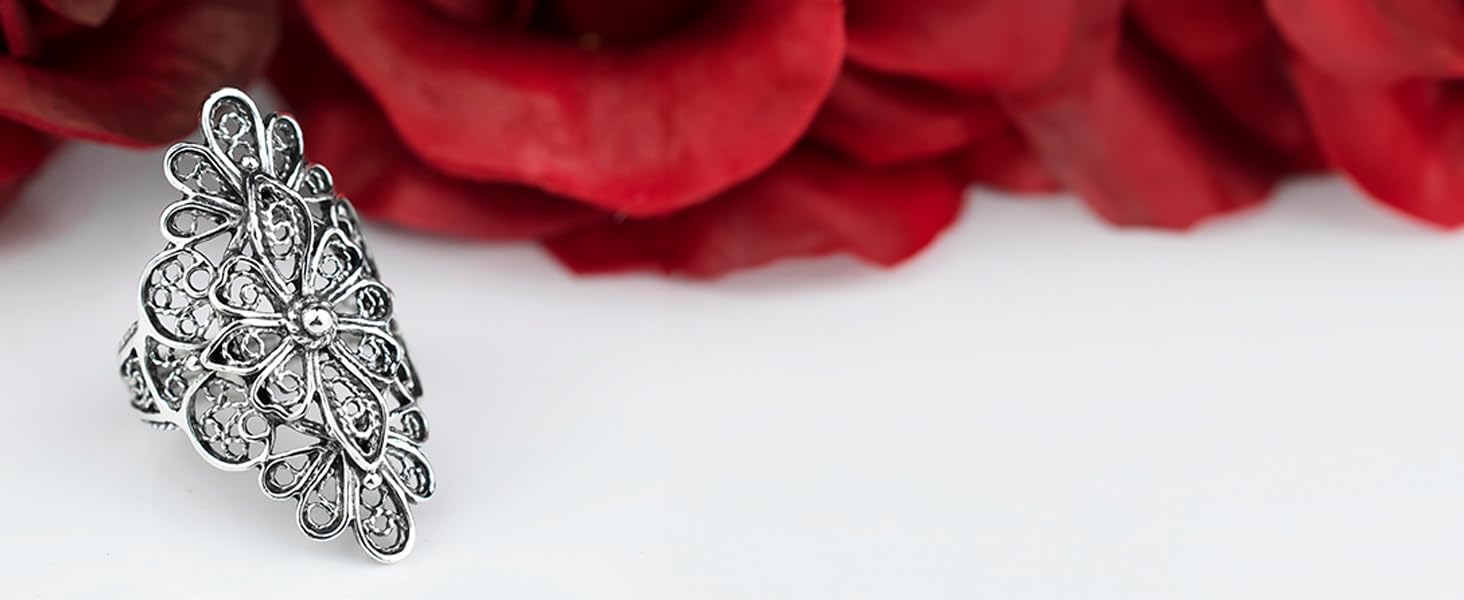 Sterling silver cross design woman statement ring