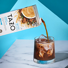 Image of Skinny Chai tea mix being poured into a glass