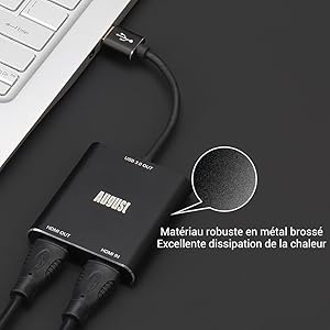 Hub USB en métal noir avec plusieurs ports connectés à un ordinateur portable. Le texte le décrit comme étant robuste avec une excellente dissipation thermique.