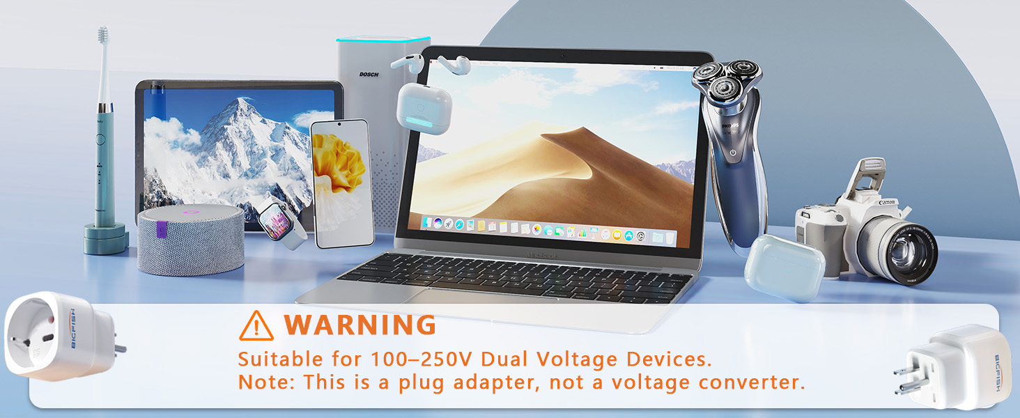 comprenant un ordinateur portable, un smartphone, une brosse à dents électrique, un appareil photo et un adaptateur de prise. L'étiquette d'avertissement indique la compatibilité à double tension pour les appareils de 100 à 250 V.