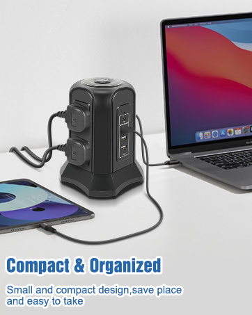 a compact speaker plugged into a laptop.