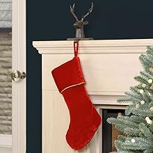 red christmas stocking hanging on a fireplace mantel