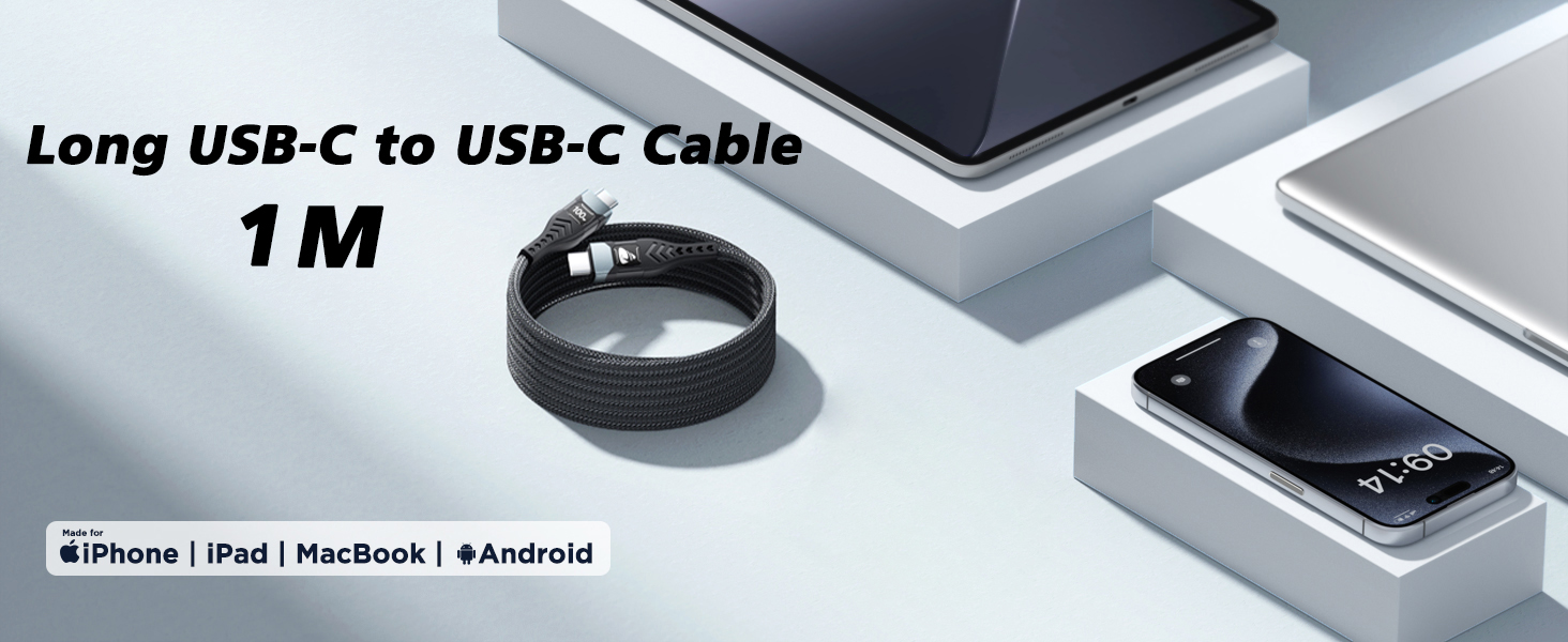 1M long USB-C to USB-C cable. Image shows coiled black cable next to smartphone and other devices.