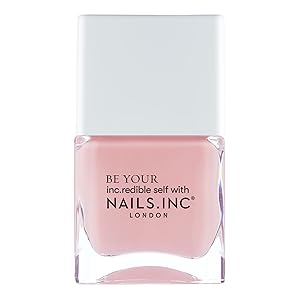 single nude nail polish with white cap