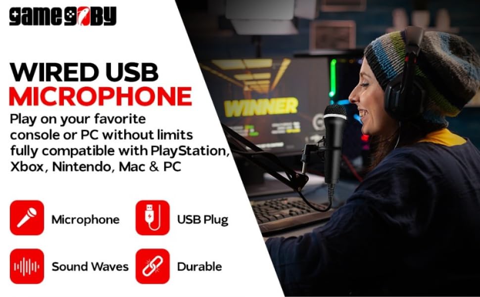 Gamer woman using wired microphone in front of computer.