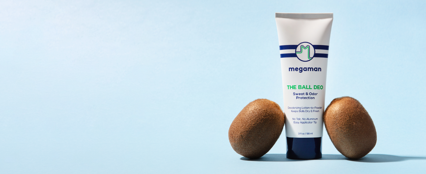 Megaman ball deodorant next to two kiwis.