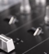 Close-up sequence of black and white images showing mechanical or electronic device operation detail.