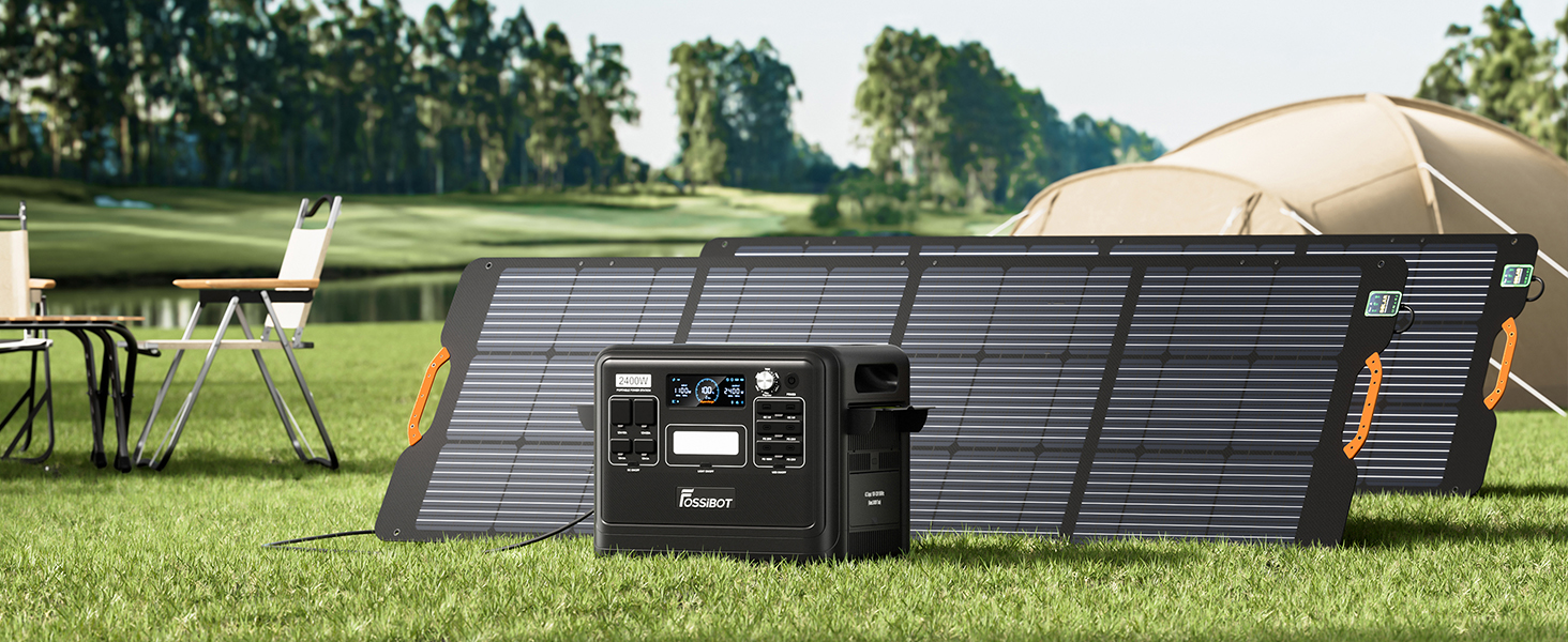 Portable solar panel array set up on grass in a sunny outdoor setting, with a power station visible in the foreground.