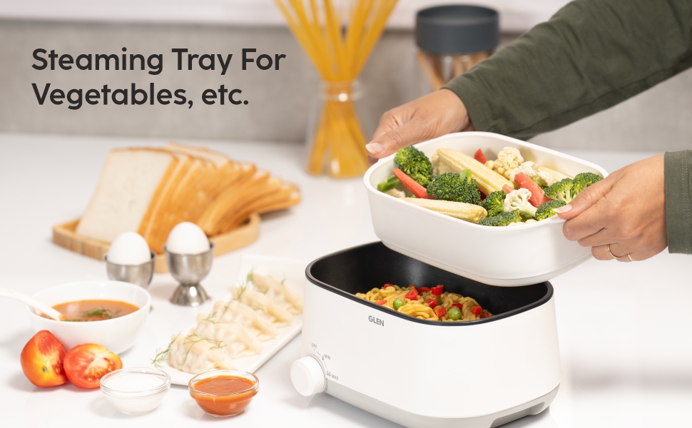 electric cooker with vegetable steamer