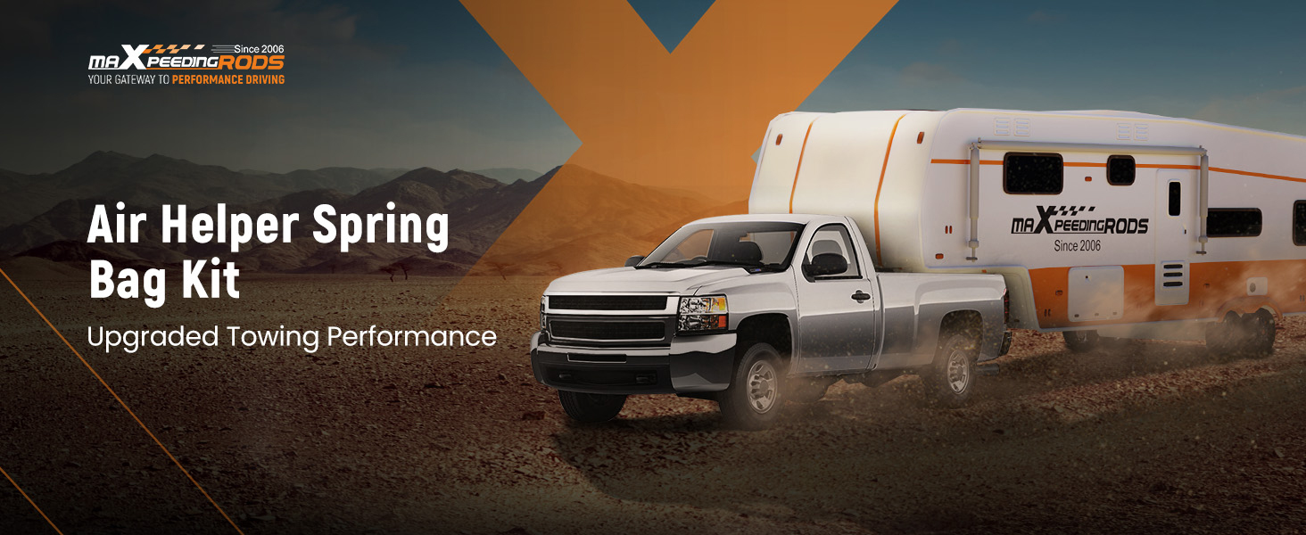 Pickup truck towing large white camper trailer on dusty road. Text overlay reads 'Air Helper Spring Bag Kit' and 'Upgraded Towing Performance', indicating a product for improved vehicle suspension.