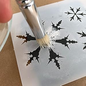Painting a snowflake stencil