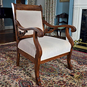 photo of wooden chair with unique upholstery and design